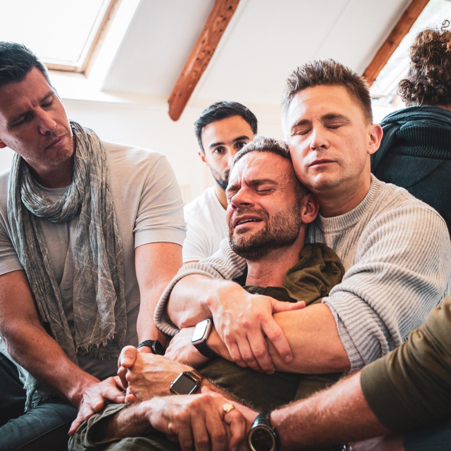 The group holding one of its own at Healing in Tribe